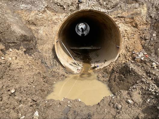 A picture containing ground, hole, dirt

Description automatically generated